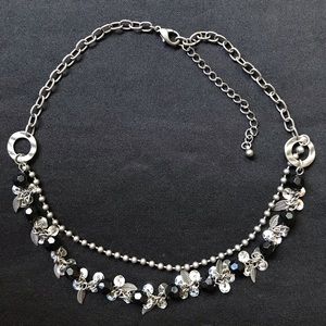 Black & metal jewelry with plastic beads & sequins